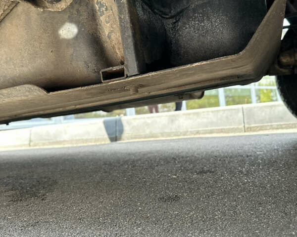 Черный Ниссан Навара, объемом двигателя 2.49 л и пробегом 300 тыс. км за 7237 $, фото 14 на Automoto.ua