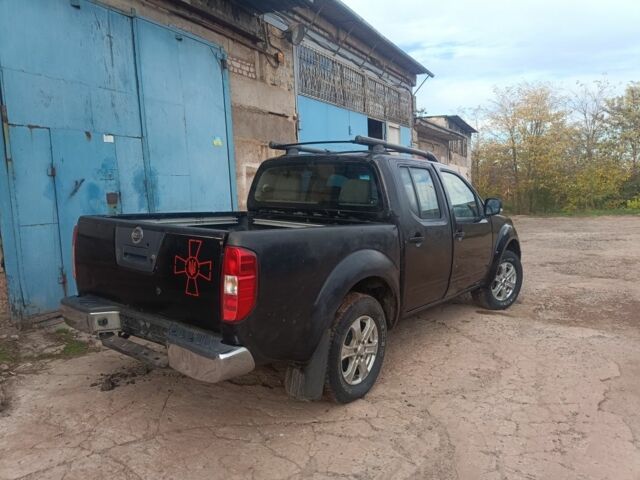Черный Ниссан Навара, объемом двигателя 2.5 л и пробегом 300 тыс. км за 2800 $, фото 4 на Automoto.ua