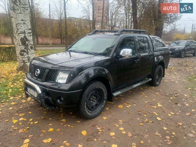 Черный Ниссан Навара, объемом двигателя 2.5 л и пробегом 260 тыс. км за 9500 $, фото 1 на Automoto.ua