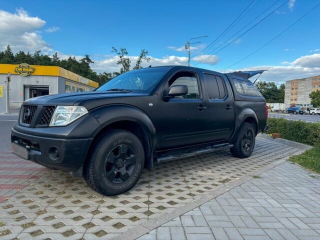 Черный Ниссан Навара, объемом двигателя 2.5 л и пробегом 250 тыс. км за 8299 $, фото 1 на Automoto.ua
