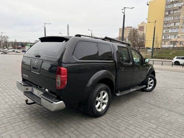 Черный Ниссан Навара, объемом двигателя 2.5 л и пробегом 260 тыс. км за 6700 $, фото 2 на Automoto.ua