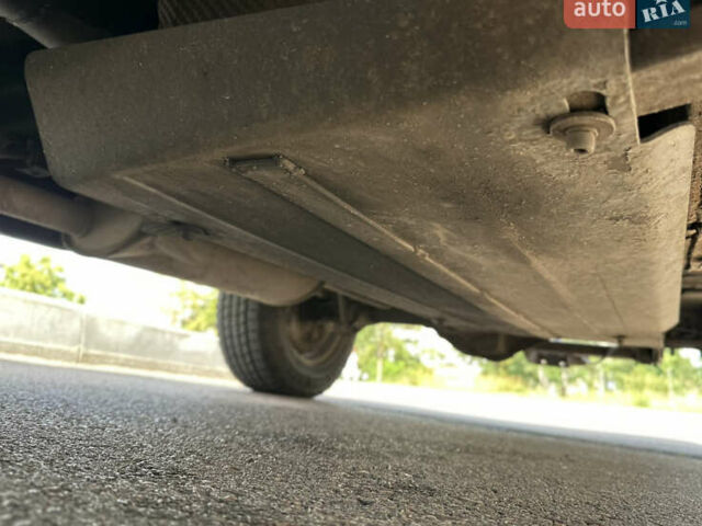 Черный Ниссан Навара, объемом двигателя 2.49 л и пробегом 300 тыс. км за 7237 $, фото 13 на Automoto.ua