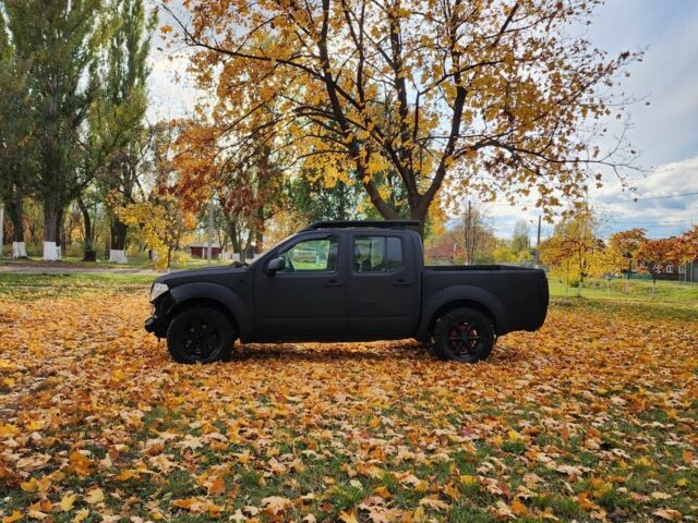 Черный Ниссан Навара, объемом двигателя 2.5 л и пробегом 260 тыс. км за 4200 $, фото 1 на Automoto.ua