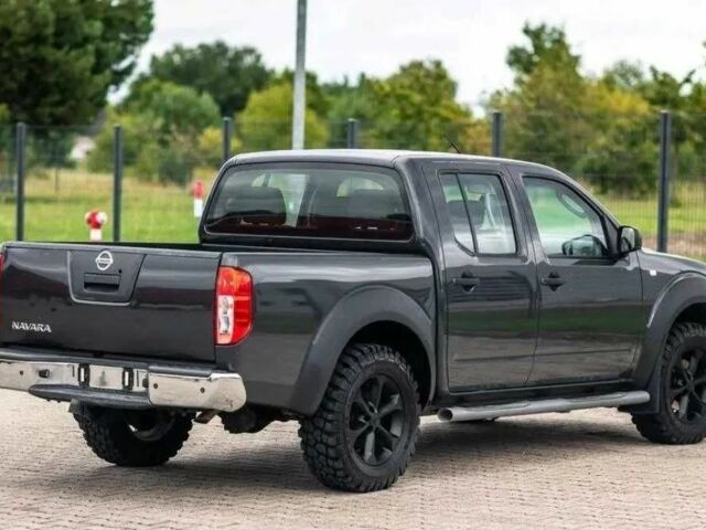 Черный Ниссан Навара, объемом двигателя 2.5 л и пробегом 221 тыс. км за 3700 $, фото 2 на Automoto.ua