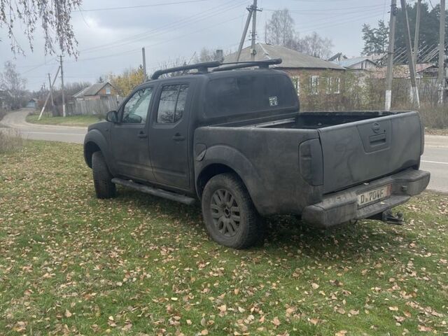 Черный Ниссан Навара, объемом двигателя 2.5 л и пробегом 239 тыс. км за 4700 $, фото 2 на Automoto.ua