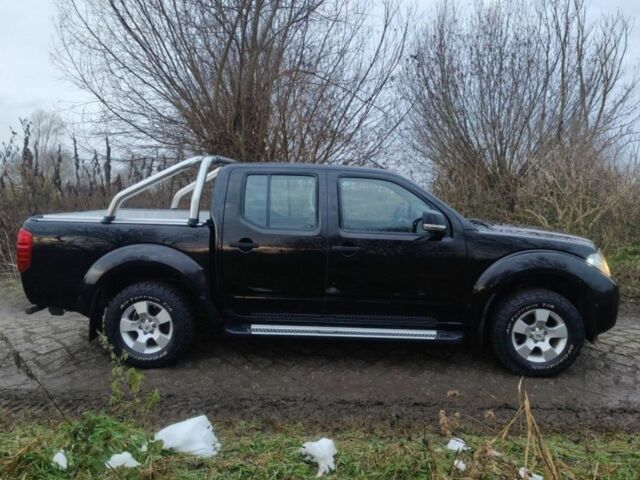 Черный Ниссан Навара, объемом двигателя 2.5 л и пробегом 223 тыс. км за 4700 $, фото 4 на Automoto.ua