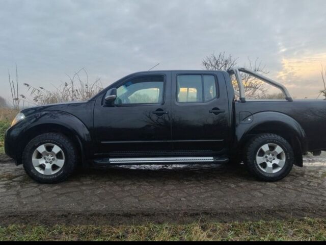 Черный Ниссан Навара, объемом двигателя 2.5 л и пробегом 223 тыс. км за 4700 $, фото 3 на Automoto.ua