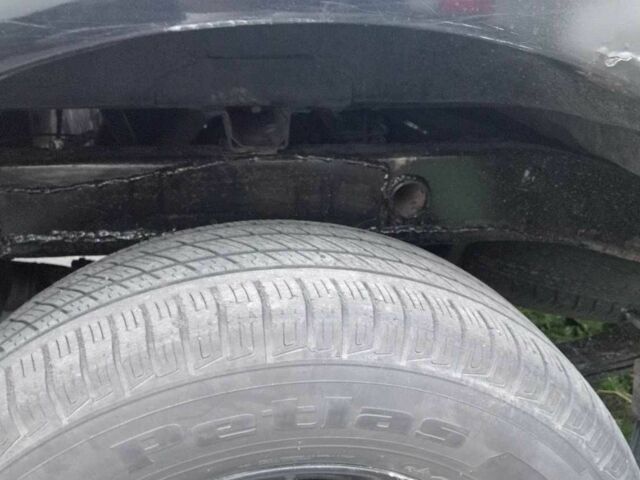 Черный Ниссан Навара, объемом двигателя 2.5 л и пробегом 256 тыс. км за 7850 $, фото 3 на Automoto.ua