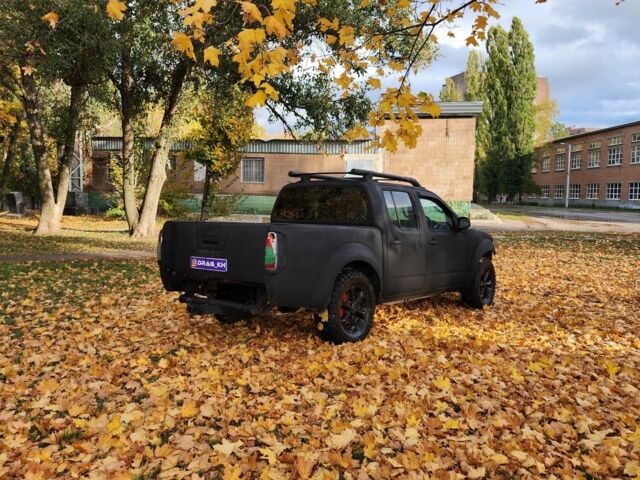Черный Ниссан Навара, объемом двигателя 2.5 л и пробегом 260 тыс. км за 4200 $, фото 4 на Automoto.ua