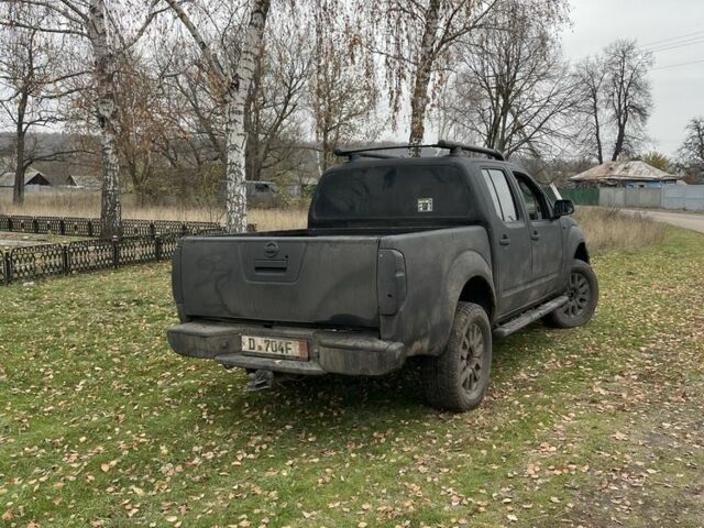 Черный Ниссан Навара, объемом двигателя 2.5 л и пробегом 239 тыс. км за 4700 $, фото 4 на Automoto.ua