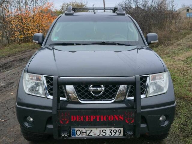 Черный Ниссан Навара, объемом двигателя 2.5 л и пробегом 240 тыс. км за 8600 $, фото 1 на Automoto.ua