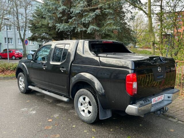 Черный Ниссан Навара, объемом двигателя 2.5 л и пробегом 218 тыс. км за 8099 $, фото 1 на Automoto.ua