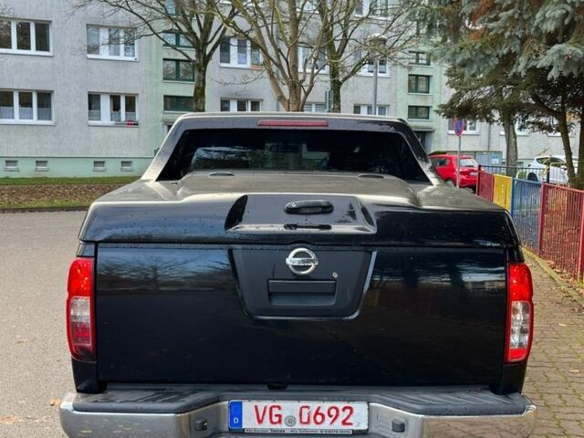 Черный Ниссан Навара, объемом двигателя 2.5 л и пробегом 218 тыс. км за 8099 $, фото 3 на Automoto.ua