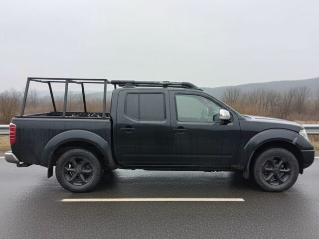 Черный Ниссан Навара, объемом двигателя 2.5 л и пробегом 280 тыс. км за 5500 $, фото 4 на Automoto.ua