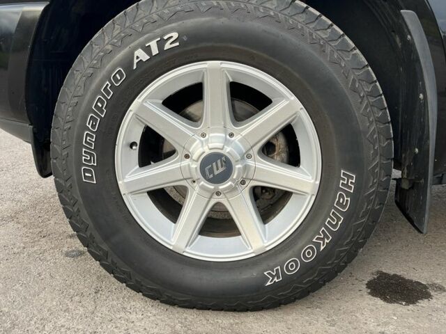 Черный Ниссан Навара, объемом двигателя 2.5 л и пробегом 177 тыс. км за 8900 $, фото 12 на Automoto.ua