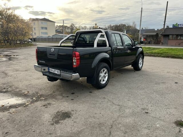 Черный Ниссан Навара, объемом двигателя 2.5 л и пробегом 177 тыс. км за 8900 $, фото 7 на Automoto.ua