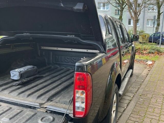 Черный Ниссан Навара, объемом двигателя 2.5 л и пробегом 218 тыс. км за 8099 $, фото 4 на Automoto.ua