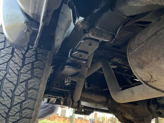 Черный Ниссан Навара, объемом двигателя 2.5 л и пробегом 177 тыс. км за 8900 $, фото 15 на Automoto.ua