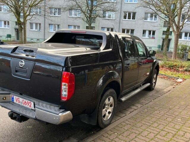 Черный Ниссан Навара, объемом двигателя 2.5 л и пробегом 218 тыс. км за 8099 $, фото 2 на Automoto.ua