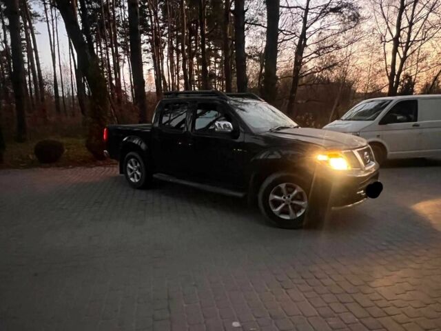 Черный Ниссан Навара, объемом двигателя 2.5 л и пробегом 180 тыс. км за 6000 $, фото 1 на Automoto.ua