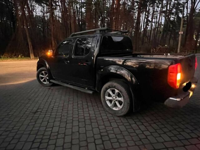 Черный Ниссан Навара, объемом двигателя 2.5 л и пробегом 180 тыс. км за 6000 $, фото 2 на Automoto.ua