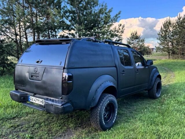 Черный Ниссан Навара, объемом двигателя 2.5 л и пробегом 200 тыс. км за 6100 $, фото 5 на Automoto.ua