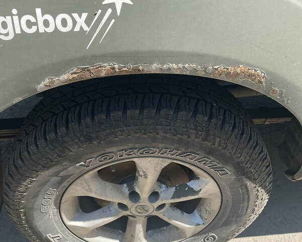 Черный Ниссан Навара, объемом двигателя 2.49 л и пробегом 429 тыс. км за 10700 $, фото 3 на Automoto.ua