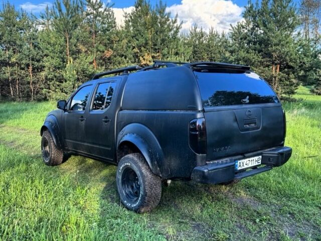 Черный Ниссан Навара, объемом двигателя 2.5 л и пробегом 200 тыс. км за 6100 $, фото 4 на Automoto.ua