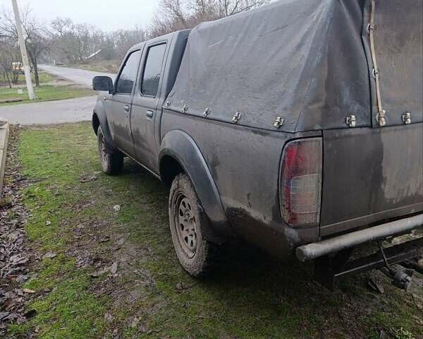 Черный Ниссан Навара, объемом двигателя 2.49 л и пробегом 287 тыс. км за 6800 $, фото 5 на Automoto.ua