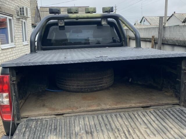 Черный Ниссан Навара, объемом двигателя 2.5 л и пробегом 314 тыс. км за 4950 $, фото 8 на Automoto.ua