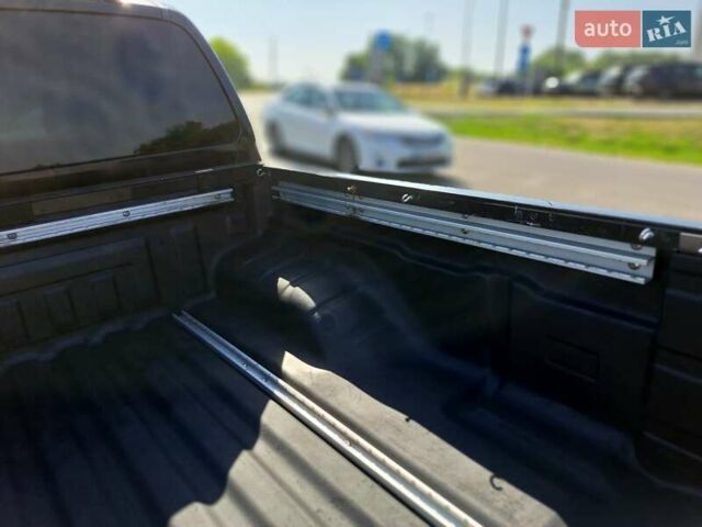 Черный Ниссан Навара, объемом двигателя 2.49 л и пробегом 244 тыс. км за 12900 $, фото 5 на Automoto.ua