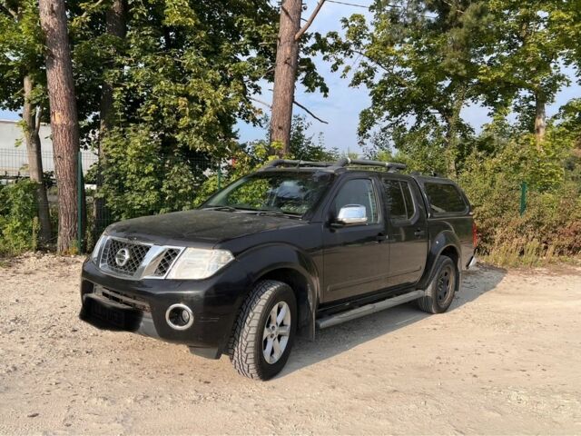 Черный Ниссан Навара, объемом двигателя 2.5 л и пробегом 130 тыс. км за 6400 $, фото 1 на Automoto.ua