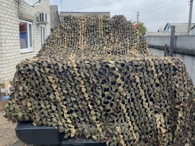 Черный Ниссан Навара, объемом двигателя 2.5 л и пробегом 314 тыс. км за 4950 $, фото 13 на Automoto.ua