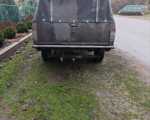 Черный Ниссан Навара, объемом двигателя 2.49 л и пробегом 287 тыс. км за 6800 $, фото 8 на Automoto.ua