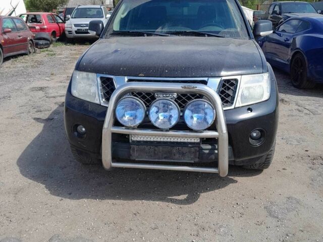 Черный Ниссан Навара, объемом двигателя 2.5 л и пробегом 252 тыс. км за 8331 $, фото 6 на Automoto.ua