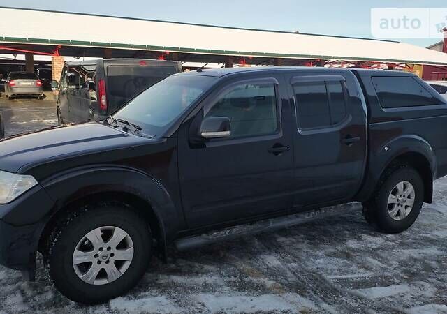 Черный Ниссан Навара, объемом двигателя 2.5 л и пробегом 320 тыс. км за 17300 $, фото 4 на Automoto.ua