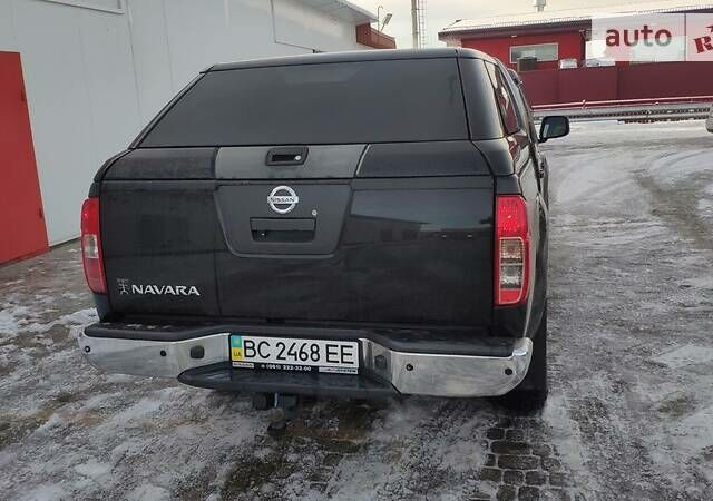 Черный Ниссан Навара, объемом двигателя 2.5 л и пробегом 320 тыс. км за 17300 $, фото 2 на Automoto.ua