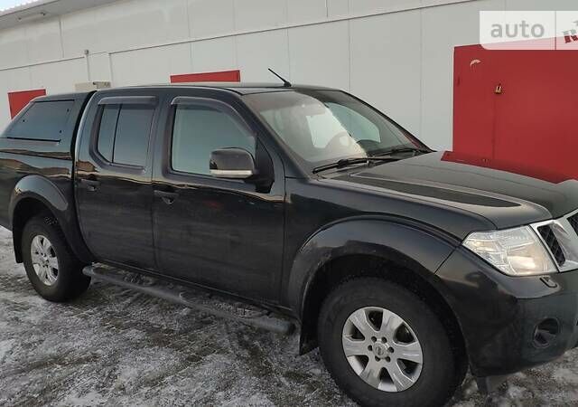 Черный Ниссан Навара, объемом двигателя 2.5 л и пробегом 320 тыс. км за 17300 $, фото 3 на Automoto.ua