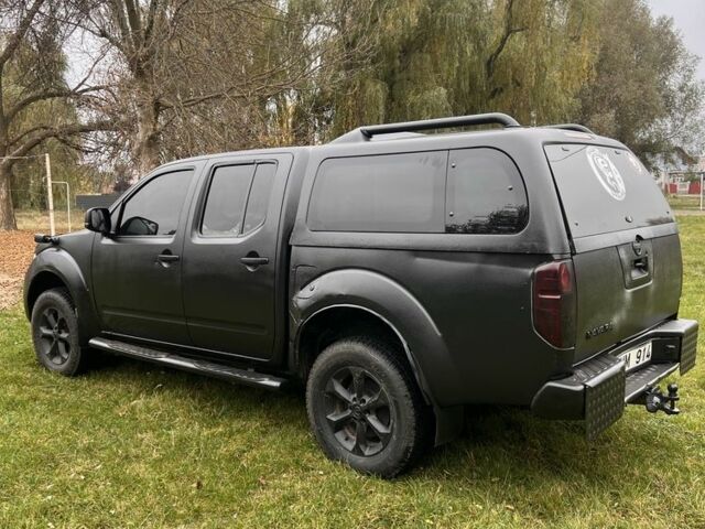 Черный Ниссан Навара, объемом двигателя 2.5 л и пробегом 200 тыс. км за 4950 $, фото 4 на Automoto.ua