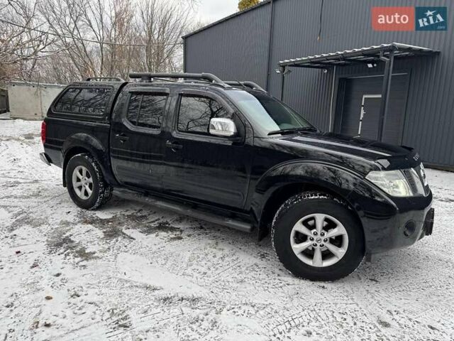 Черный Ниссан Навара, объемом двигателя 2.5 л и пробегом 143 тыс. км за 17490 $, фото 3 на Automoto.ua