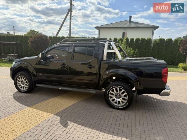 Чорний Ніссан Навара, об'ємом двигуна 2.99 л та пробігом 245 тис. км за 15400 $, фото 3 на Automoto.ua
