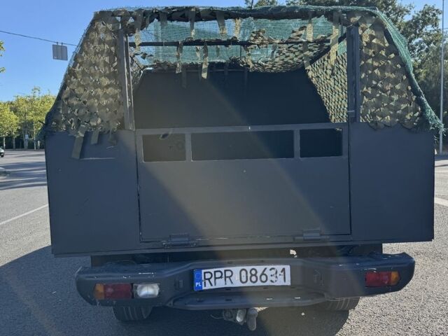 Чорний Ніссан Навара, об'ємом двигуна 2.5 л та пробігом 150 тис. км за 4000 $, фото 4 на Automoto.ua