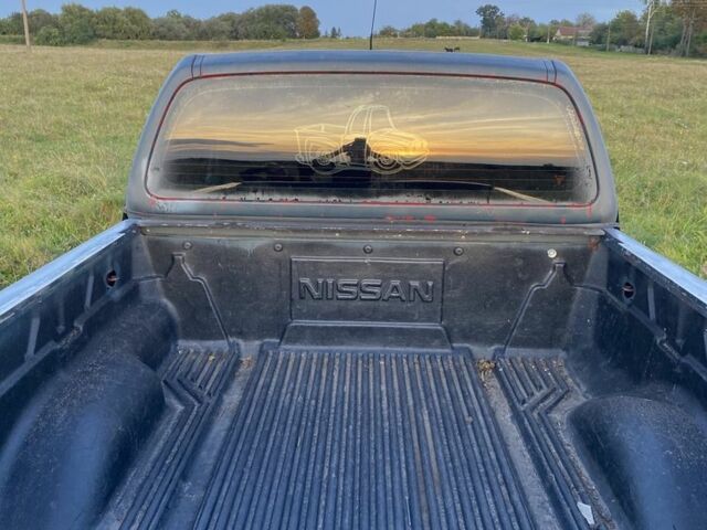 Черный Ниссан Навара, объемом двигателя 2.5 л и пробегом 220 тыс. км за 5200 $, фото 23 на Automoto.ua