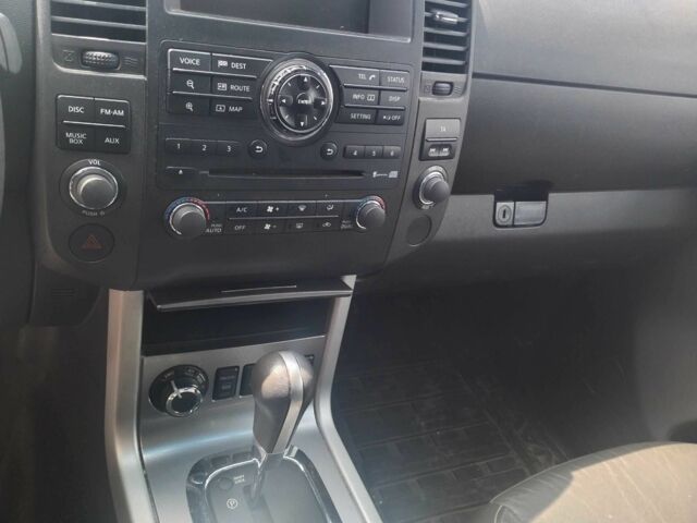 Черный Ниссан Навара, объемом двигателя 3 л и пробегом 350 тыс. км за 11001 $, фото 1 на Automoto.ua