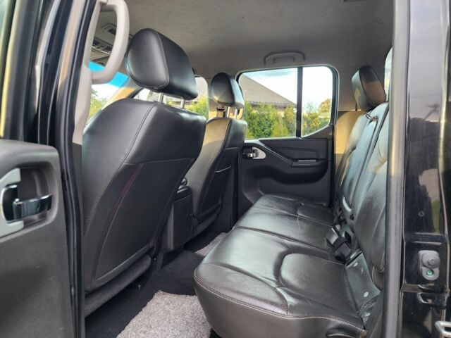 Черный Ниссан Навара, объемом двигателя 2.5 л и пробегом 101 тыс. км за 7915 $, фото 20 на Automoto.ua