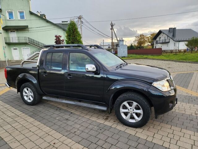 Черный Ниссан Навара, объемом двигателя 2.5 л и пробегом 101 тыс. км за 7915 $, фото 1 на Automoto.ua