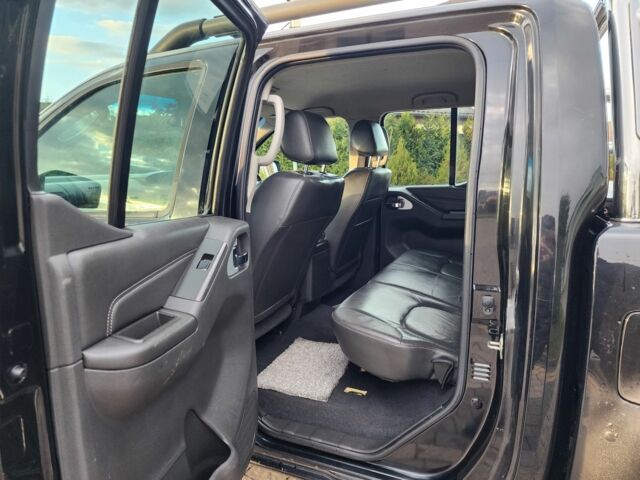 Черный Ниссан Навара, объемом двигателя 2.5 л и пробегом 101 тыс. км за 7915 $, фото 19 на Automoto.ua