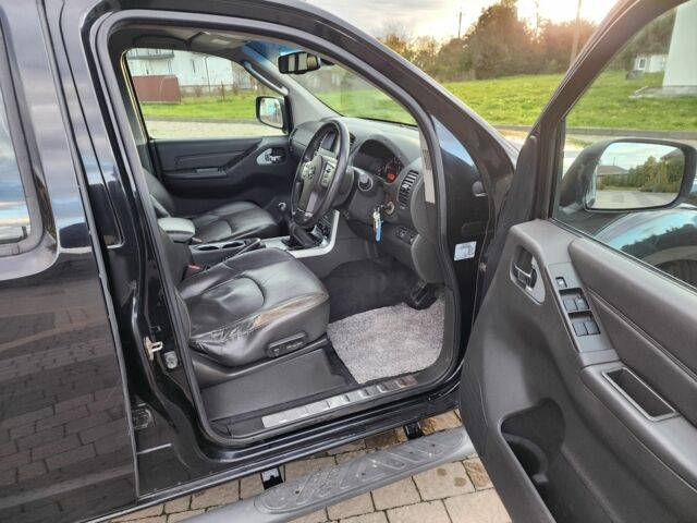 Черный Ниссан Навара, объемом двигателя 2.5 л и пробегом 101 тыс. км за 7915 $, фото 13 на Automoto.ua