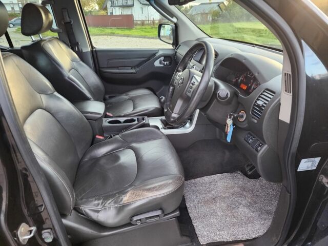 Черный Ниссан Навара, объемом двигателя 2.5 л и пробегом 101 тыс. км за 7915 $, фото 14 на Automoto.ua