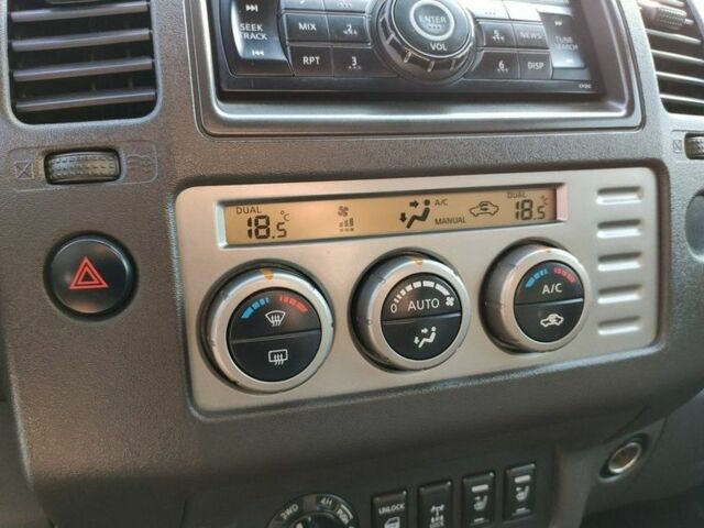 Черный Ниссан Навара, объемом двигателя 2.5 л и пробегом 339 тыс. км за 4500 $, фото 14 на Automoto.ua